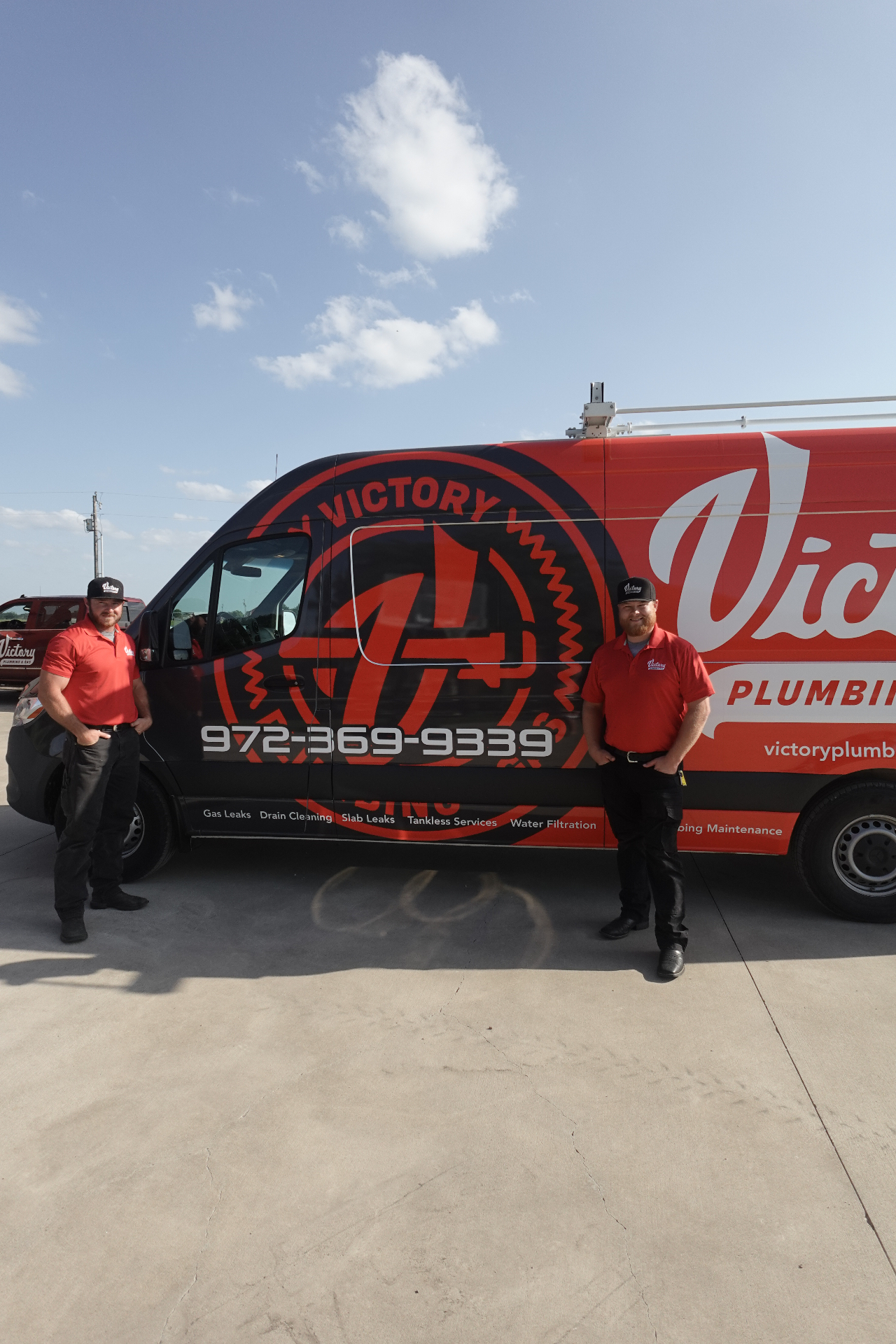 Victory Plumbing and Gas service van and team
